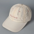 Detailed embroidery of pink Magical secrets on ripstop fabric baseball cap in cream - Off White