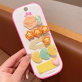 Close-up of macaron color flower and heart resin hair clips set on a display card - 5-Piece Yellow Set