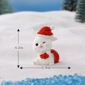 Weihnachtliche Hasenfigur aus Harz mit Nikolausmütze und Sack, Höhe 4,2 cm, Breite 2,8 cm - Nr. 4 Weihnachtsmütze mit Geschenktüte