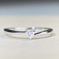 Macro shot of heart-cut moissanite stone and sleek twisted silver band detail - US 5 / Heart Cut Twist Band-Silver