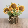 Handcrafted crochet sunflower potted plant in rustic bark pot with raffia bow - Wooden Potted Sunflower