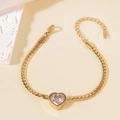 Detail of gold stainless steel bracelet with heart zircon and lobster clasp closure - Heart Clear Zirconia Bracelet
