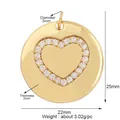 Macro shot of 22mm gold round pendant with micro-pave heart center on white backdrop - L616819-Gold