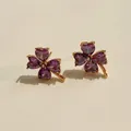 Clover stud earrings in gold finish with purple heart-shaped cubic zirconia stones - Gold Purple