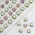 Macro shot of 8mm iridescent star-shaped glass crystal beads for DIY jewelry making - Rose Red Green