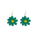 Handmade woven daisy drop earrings with blue petals and raffia texture on white background - Green