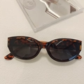 Chic tortoiseshell cat eye sunglasses with dark lenses for a trendy retro fashion look - Tortoiseshell 36