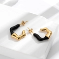 Elegant gold and black C-shaped irregular titanium steel earrings on a white stone base - Irregular Black Gold C-Shaped Earrings ER-856