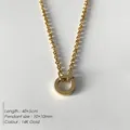 Collier en acier inoxydable plaqué or 14K avec pendentif cercle et chaîne réglable - Collier Fermoir Cercle Uni Or 14K (XNL0017-2)