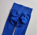 High-waisted scrunch butt yoga pants in vibrant cobalt blue with seamless texture - Klein Blue
