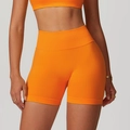 Seamless high waisted orange yoga shorts for women with elastic supportive waistband - Persimmon Orange