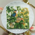 Blue bird and chicks watercolor print square paper napkins on white floral ceramic plate - Blue Bird & Nestlings (1066)