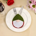 Porte-couverts de Noël gnome avec chapeau vert et barbe blanche sur une assiette - Style Gnome Vert