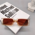 Retro square sunglasses with translucent amber frames and reddish-brown tinted lenses - Champagne