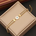 Bracelet trois couches en acier doré avec pendentif œil et zircon sur boîte à bijoux - Style Œil du Diable (2#Eye)