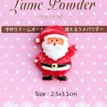 Detail showing a 2.5x3.1cm Santa Claus resin flatback ornament with classic red outfit - Waving Santa-Right