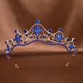 Baroque gold bridal crown with deep blue rhinestones on a brown silk background - All Royal Blue