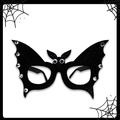 Gros plan sur les lunettes de chauve-souris noires à paillettes avec des strass brillants - Chauve-souris