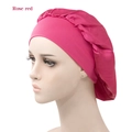 Detail view of rose red satin sleep bonnet with wide elastic band on mannequin head - Adjustable / Rose Red