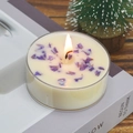 Handmade cream scented tea light candle with purple dried flowers in clear container - Lavender