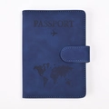 Close-up of deep blue RFID PU leather passport holder with embossed map and buckle strap - Dark Blue