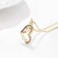 Close-up of gold heart pendant with MOM letters and colorful zircon stones on thin chain - Gold Heart Colored Zirconia Mom