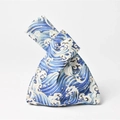 Close-up of Japanese knot bag featuring navy blue Great Wave print on linen fabric - Gilded Dark Blue
