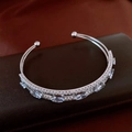 Macro shot of silver-tone open bangle with marquise-cut gems and micro-pave setting - Silver Marquise Stone Double Row Style (39#)