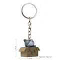 Cute grey striped cat figurine in a brown box charm keychain for couples - Keychain / Seeking Adoption Red-Mouth Gray Cat