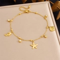 Gouden roestvrijstalen enkelbandje met bedeltjes van zeesterren en zeepaardjes - Gouden Marine Thema Stijl (B1704)