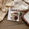 Cute handmade knitted hair clips with rabbit and mushroom designs on white card - Carrot Rabbit Hair Clip