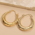 Pair of 14K gold plated twisted hoop earrings with chunky spiral texture and spring clasp - Spiral Crescent Style