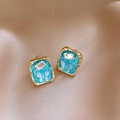 Detailed macro of gold butterfly earrings with blue resin and rectangular gemstone - Gold Square Blue Transparent Butterfly Relief (32#)