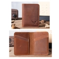 Vertical bi-fold vintage brown crazy horse leather card holder with bull logo in a rustic setting - With Logo / Reddish Brown With Bull Logo