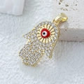 Golden Hamsa Hand pendant with clear zircons and a red evil eye center detail - D3515JH Pendant 30