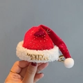 Mini red velvet Christmas hat hair clip with gold Merry Christmas lettering on gold duckbill clip - Starlight Santa Hat Red Clip