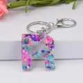 Resin letter R keychain with colorful blue and pink stones and silver lobster clasp - Letter R