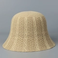 Detailed view of the breathable knitted pattern and cable texture on the beige bucket hat - M (56-58cm) / Beige