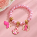 Bracelet de perles roses avec breloques ruban rose et détails dorés élégants - Bracelet en Perles Artificielles Dorées (5329)