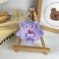 Cute purple plush monster keychain with blue star bow for backpack decoration - Pocket Monster - Purple