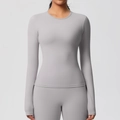 Detail of grey long sleeve yoga set showing high-elastic seamless fabric texture - Frost Grey