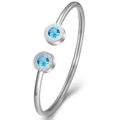 Silver stainless steel open bangle featuring blue birthstones and Roman numerals - Aquamarine