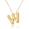 Macro shot of 3D balloon style golden letter W pendant with mirror reflection on white - Letter W / Gold