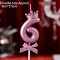 Number 6 birthday candle in metallic pink-purple finish with crown and bow details - Number Candles Pink With Crown And Bow (6)