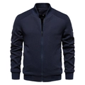 Detailed view of the navy blue jacket with honeycomb texture and ribbed stand collar - Dark Blue