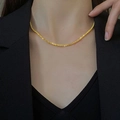 Collana a stella dorata scintillante in acciaio al titanio stile lusso da donna - Collana / Collana Oro