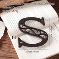 Vintage style cast iron letter S wall decor with rustic brown finish and mounting screws - Letter S