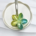 Frangipani hair claw clip with yellow, green, and blue gradient pearlescent finish - Yellow & Teal Green AB
