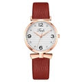 Women's quartz watch featuring a burgundy leather strap and rose gold case with white dial - Red