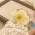 Elegant pale yellow mesh flower hair clip with realistic petals and white lace sleeve detail - Beige Poppy